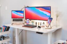 black flat screen tv on white wooden table